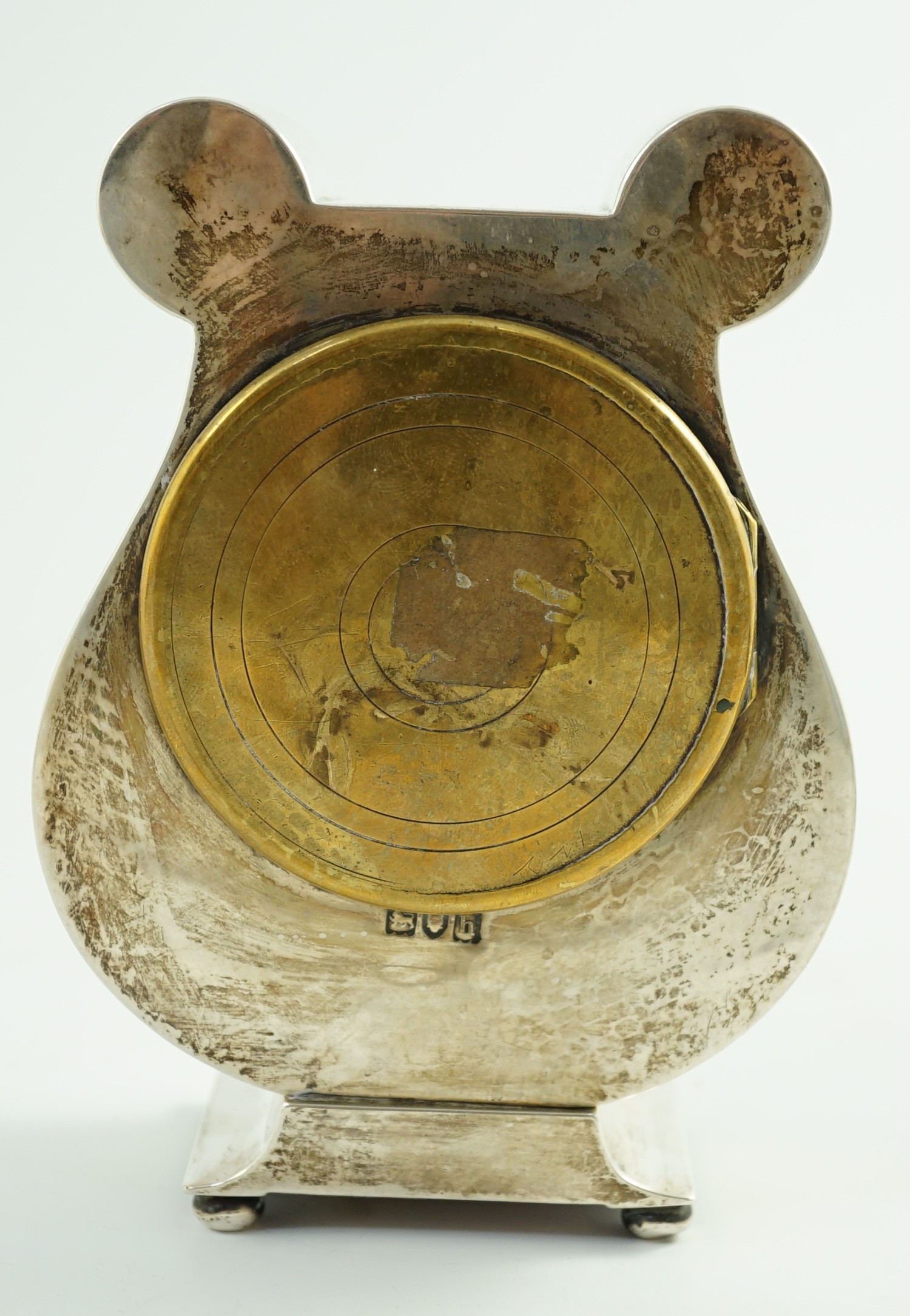An Edwardian Art Nouveau silver cased mantel timepiece